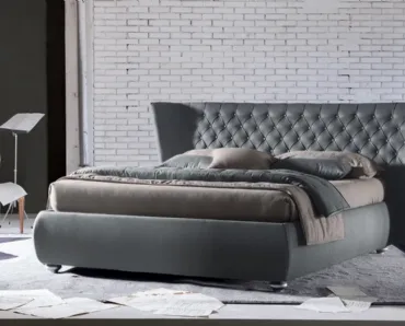Letto in tessuto con testiera imponente trapuntata lavorazione capitonné Giselle di Ergogreen