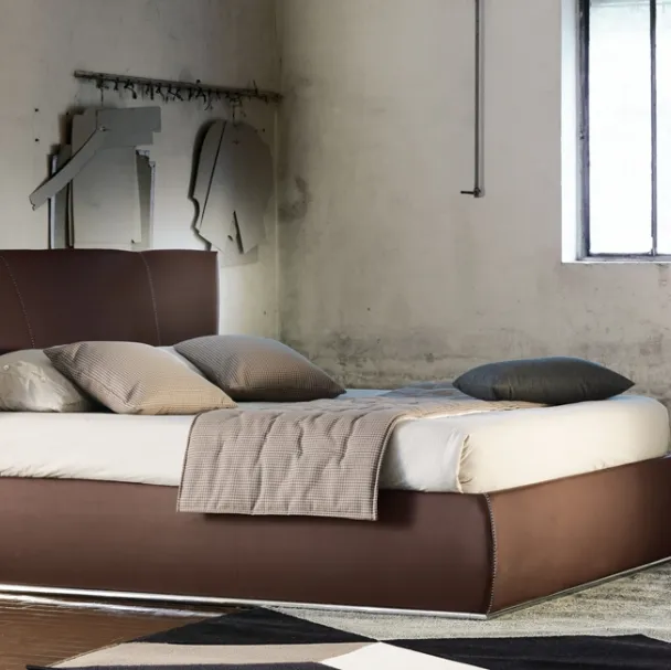 Letto in ecopelle con box contenitore e importante testiera Giselle Plain di Ergogreen