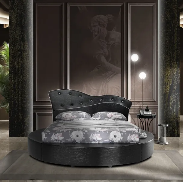 Letto rotondo in ecopelle scura e bottoni chiari Tondo di Artigianaletti