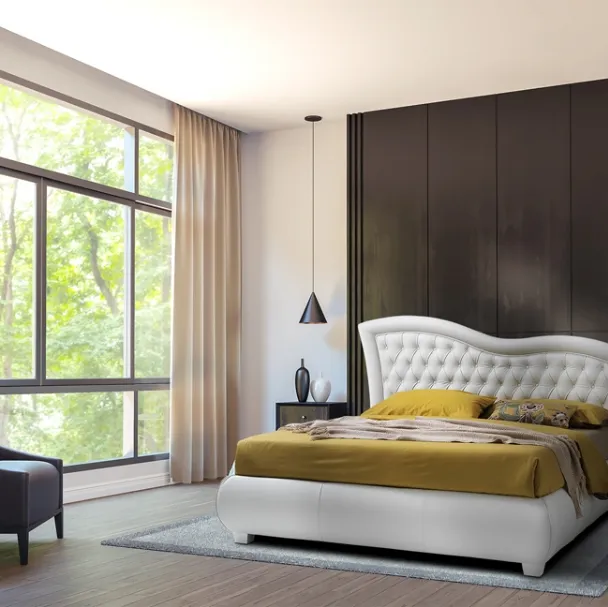 Letto con giroletto bombato e testiera lavorazione capitonnè con cornice ondulata Vivaldi di Artigianaletti