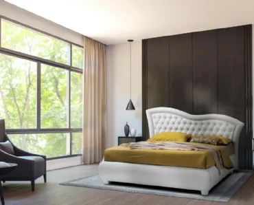 Letto con giroletto bombato e testiera lavorazione capitonnè con cornice ondulata Vivaldi di Artigianaletti
